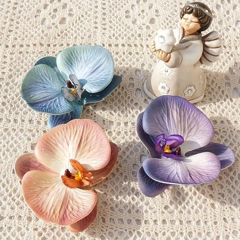 Tocado de orquídeas y mariposa - Event Suppliers reseña y precio