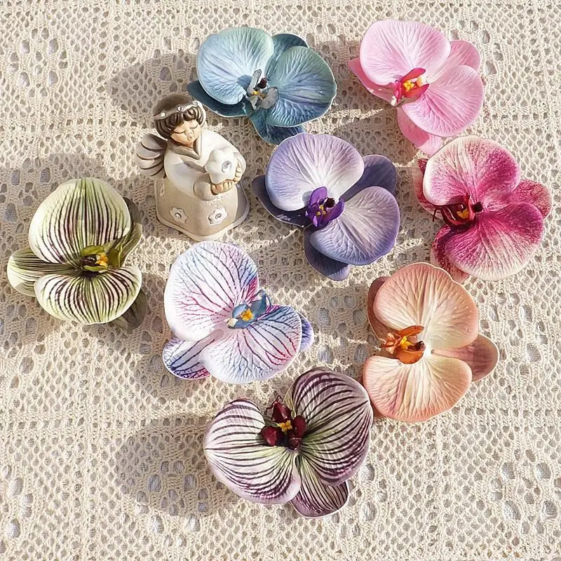 Tocado de orquídeas y mariposa - Event Suppliers reseña y precio