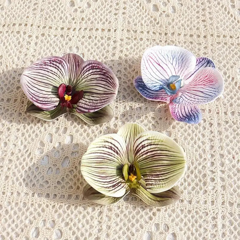 Tocado de orquídeas y mariposa - Event Suppliers reseña y precio